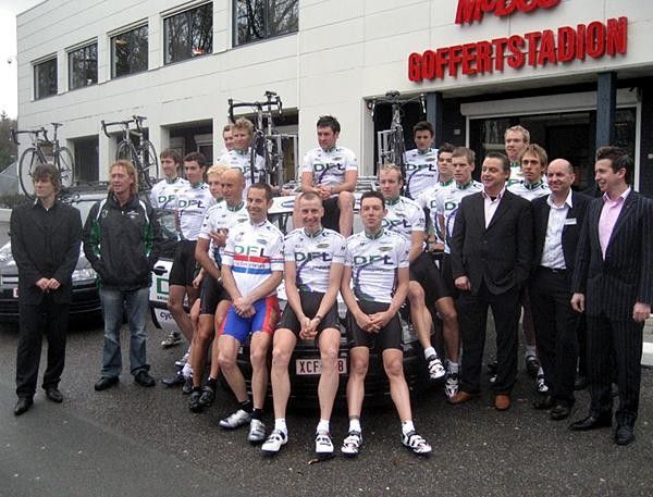 The full posse behind the DFL-Cyclingnews-Litespeed squad pose outside the McDOS Goffertstadion in Nijmegen, Holland. One of the key sponsors of the team is leading Dutch IT distributor, McDOS, which also owns the naming rights to the local football stadium.