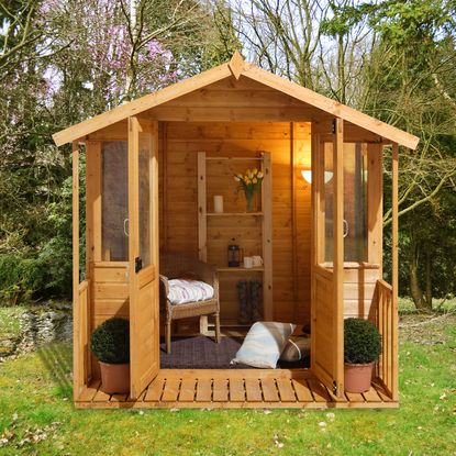 wooden summerhouse with veranda