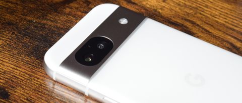 A Google Pixel 8a face down on a table