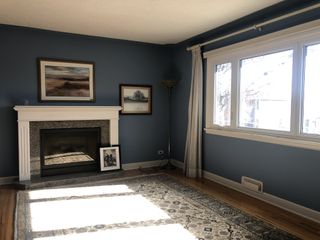 living room with blue walls, before renovation