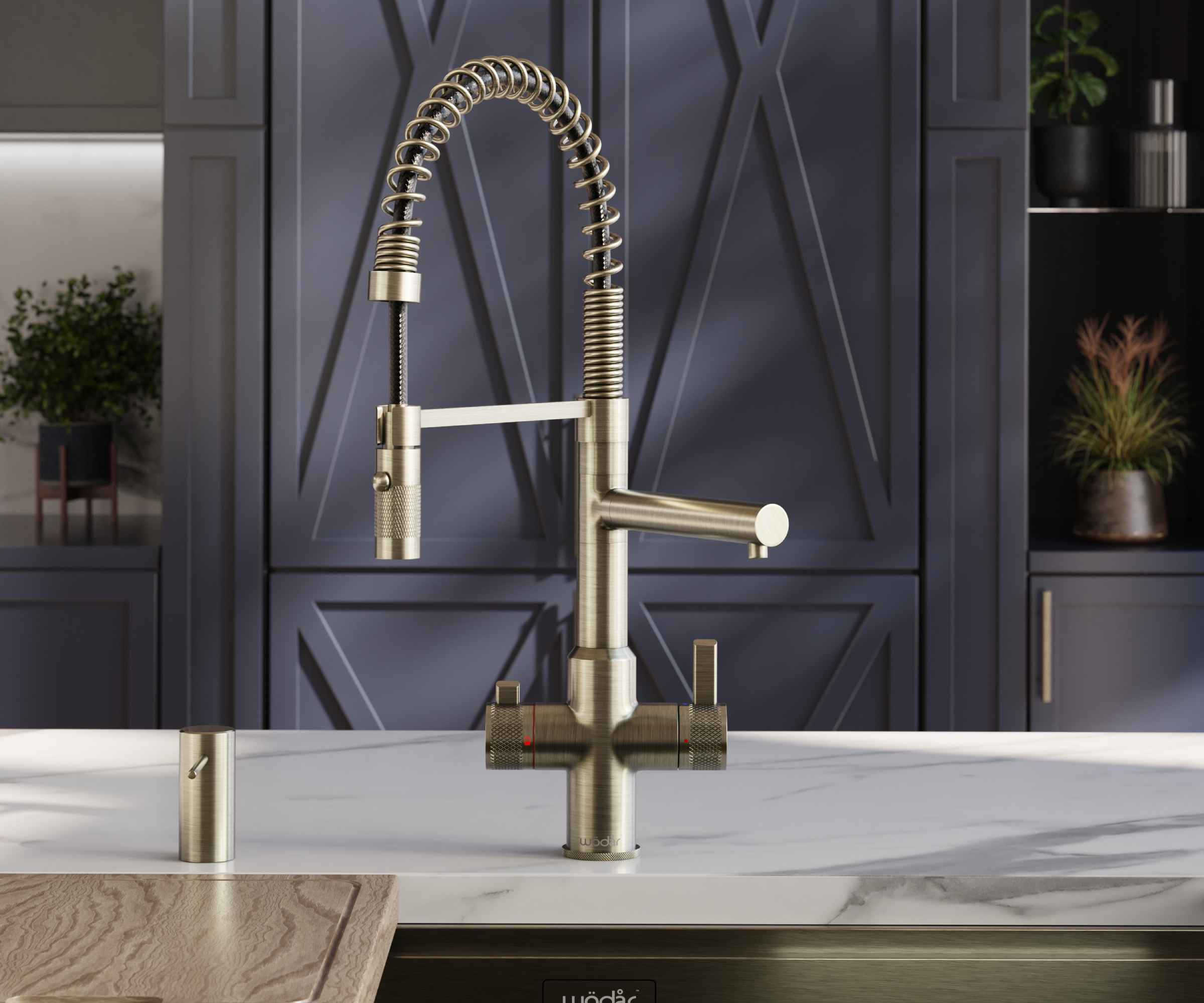 multi-functional kitchen tap in brass with built-in soap dispenser mounted in worktop