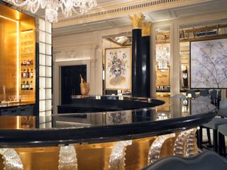 Artists' Bar at the dorchester with black stone and gold bar