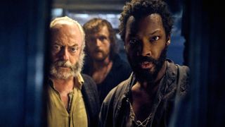 Liam Cunningham and Corey Hawkins in "The Last Voyage of the Demeter"