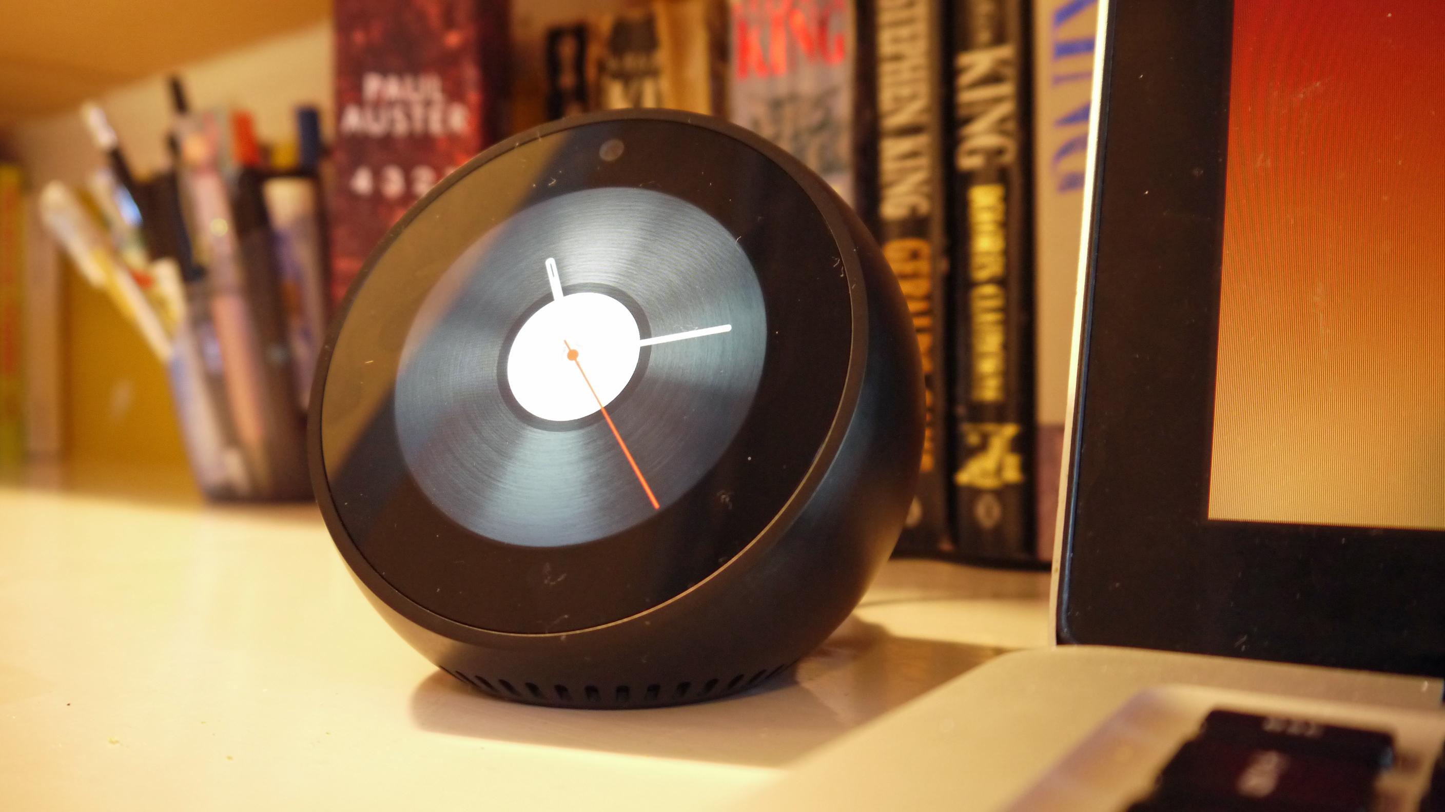 The Amazon Echo Spot speaker on top of a tableside