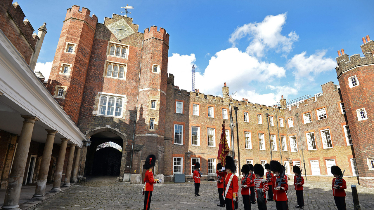 The St James&#039;s Palace detachment of The Queen&#039;s Guard turns out in Colour Court, St James Palace, for the arrival of Britain&#039;s Queen Elizabeth II, ahead of the christening of Prince George by the Archbishop of Canterbury on October 23, 2013.