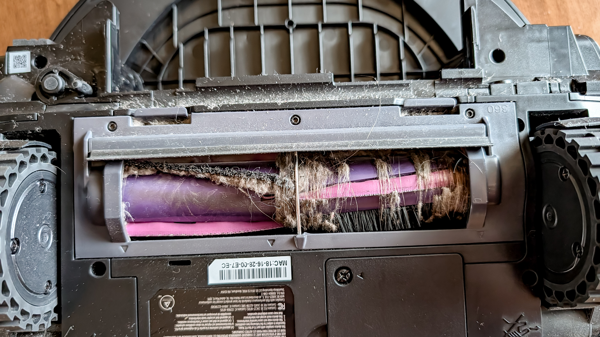 The underneath of a Shark UV Reveal PowerDetect Robot Vacuum