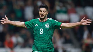 Ra&uacute;l Jim&eacute;nez of Mexico celebrates the team's second goal scored by an own goal of Stefan Bukinac of Serbia (not in frame) during the international friendly match between Mexico and Serbia