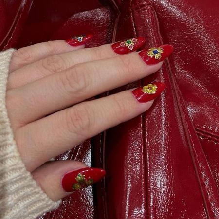 Nails with nail stickers.