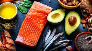 A selection of protein-rich foods, including salmon and sardines