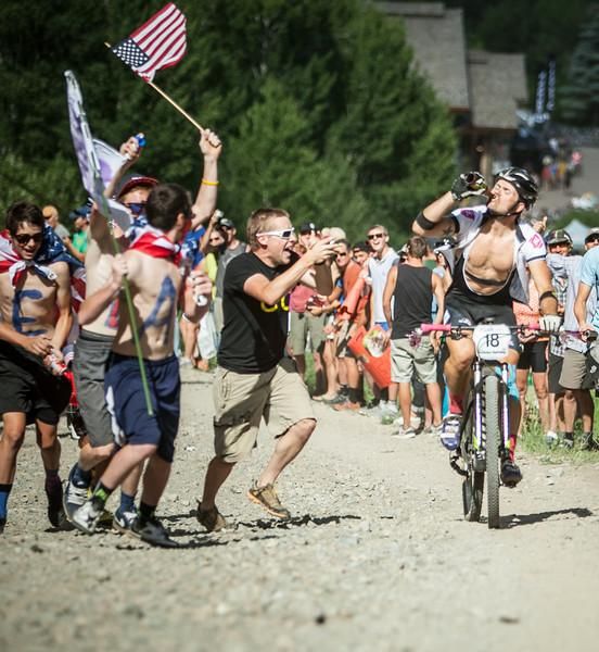 A rider gets a beer handoff during events at the Ride Sun Valley in Idaho