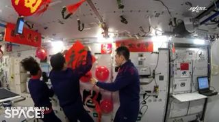 Chinese astronauts on the Tiangong space station module Tianhe decorated their space home for the lunar new year to ring in the Year of the Tiger in orbit on Feb. 1, 2022.