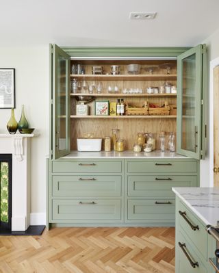 light green kitchen breakfast pantry with glass doors