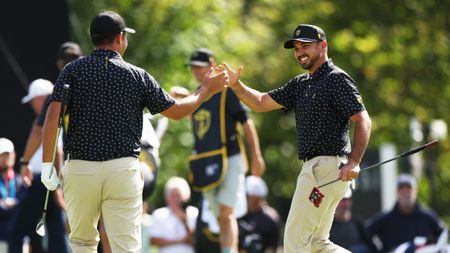 Jason Day and Ben An celebrate during the Presidents Cup