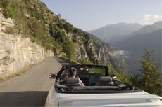 A ride in a convertible down a narrow, windy road in the French Alpes-Maritimes.