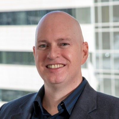 Smiling headshot of Mark Towler.
