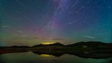 The Perseid meteor shower is seen over the Ulanbum grassland in Chifeng city, Inner Mongolia, China, August 14, 2023. (Photo by Costfoto/NurPhoto via Getty Images)