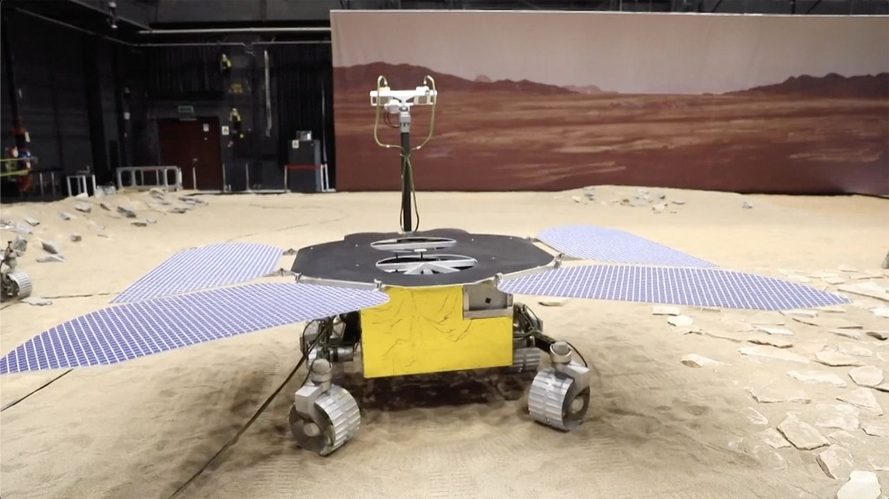 China's Tianwan-1 Mars rover is pictured at the "Mars yard," a simulated Red Planet testing ground at the China Academy of Space Technology in Beijing, China.