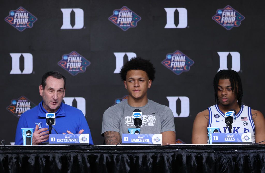 Mike Krzyzewski, Paolo Banchero, and Trevor Keels 