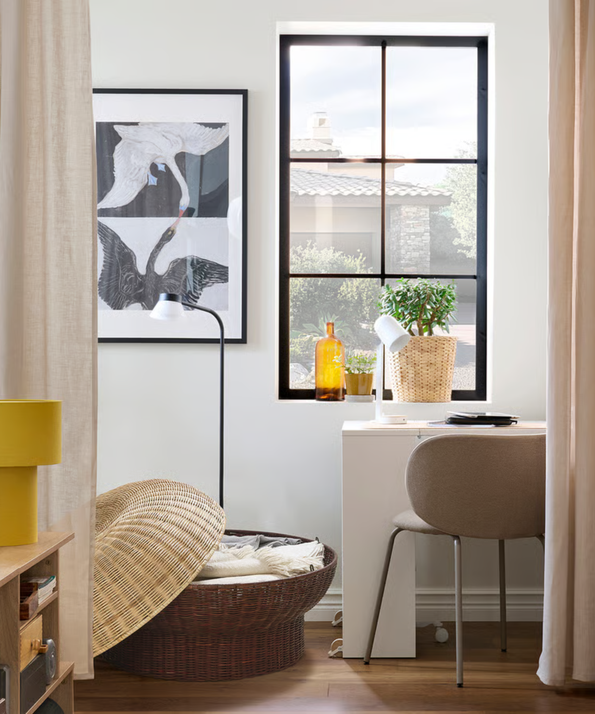 a desk with a large storage ottoman to one side