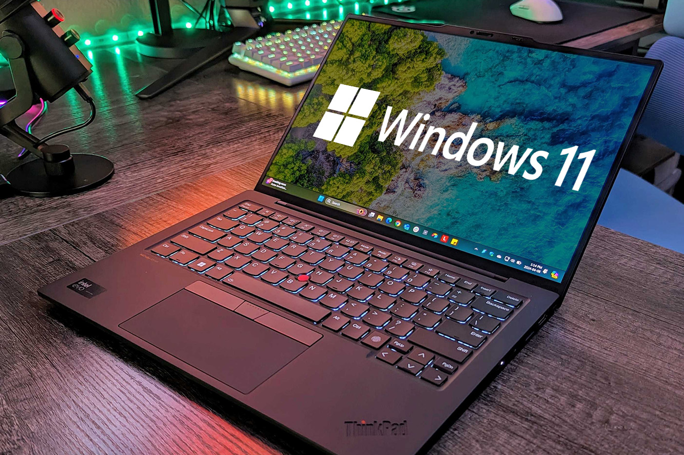 Image of the Lenovo ThinkPad X1 Carbon (Gen 12) with Windows 11 logo.