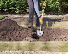 Filling a raised bed with soil