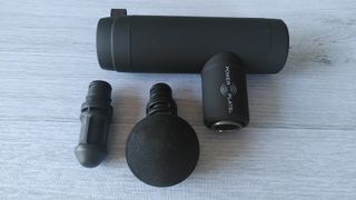 Power Plate Mini+ massage gun with attachments