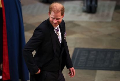 Britain's Prince Harry, Duke of Sussex, arrives at Westminster Abbey in central London on May 6, 2023, ahead of the coronations of Britain's King Charles III and Britain's Camilla, Queen Consort. - The set-piece coronation is the first in Britain in 70 years, and only the second in history to be televised. Charles will be the 40th reigning monarch to be crowned at the central London church since King William I in 1066. Outside the UK, he is also king of 14 other Commonwealth countries, including Australia, Canada and New Zealand. Camilla, his second wife, will be crowned queen alongside him, and be known as Queen Camilla after the ceremony. (Photo by PHIL NOBLE / POOL / AFP) (Photo by PHIL NOBLE/POOL/AFP via Getty Images)