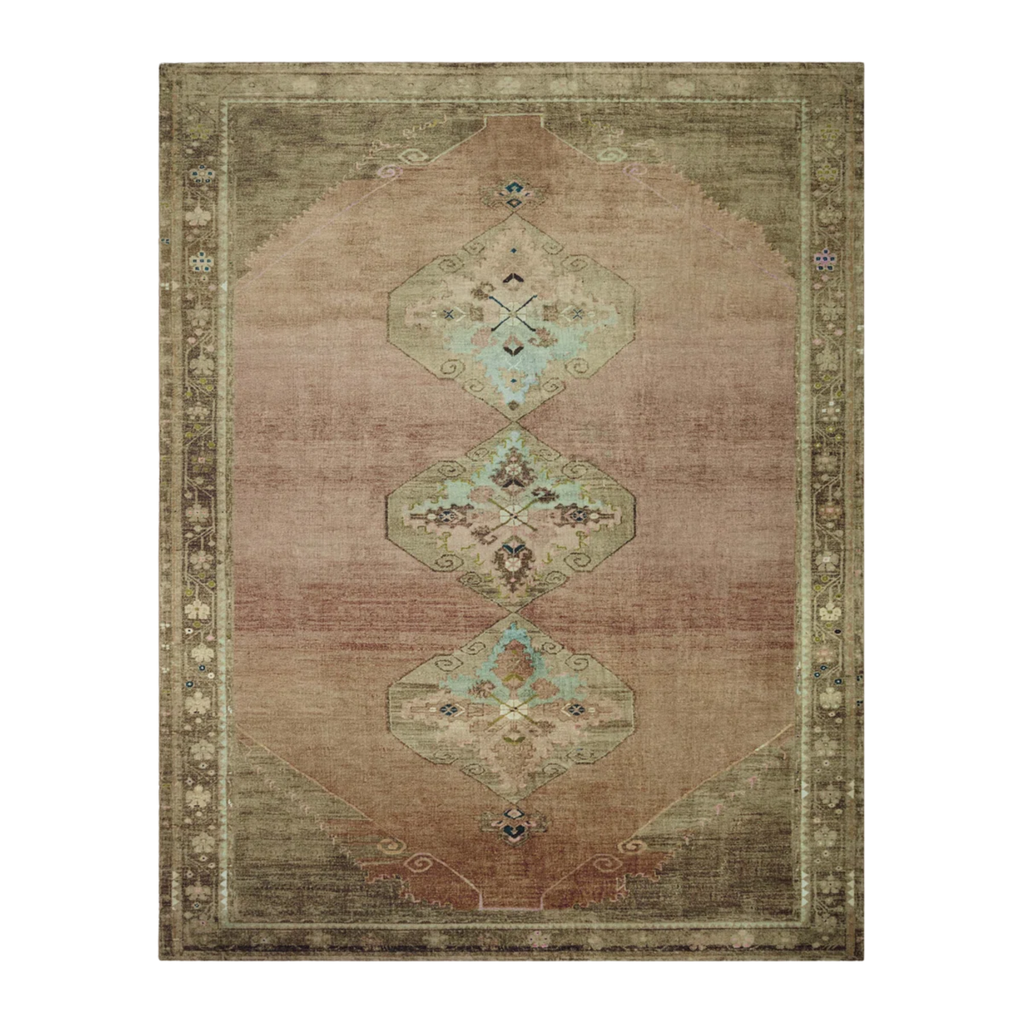 a vintage inspired rug with a central diamond motif