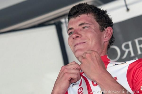 Julien Berard (AG2R La Mondiale) zips up the mountains classification leader's jersey.