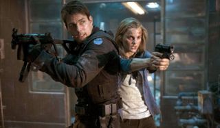 Mission: Impossible III Tom Cruise and Keri Russell with guns drawn