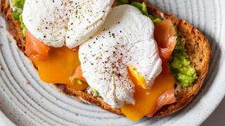 Poached eggs on salmon with avocado crushed toast