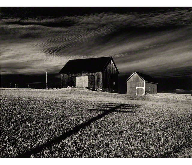 Black and white shots of two barns