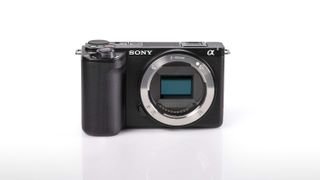 Sony ZV-E10 II on reflective surface and white background