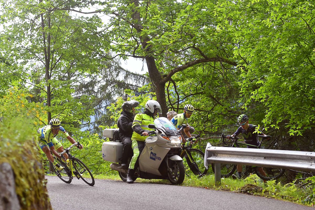 Igor Anton (Movistar) and Roman Kreuziger (Tinkoff-Saxo) come unstuck descending the Passo Daone