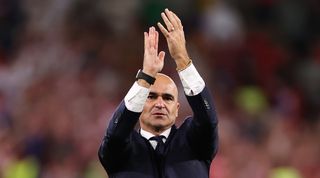 Roberto Martinez applauds the Belgium fans following the team's 0-0 draw against Croatia in Qatar, which saw the Red Devils knocked out of the World Cup in the group stages.