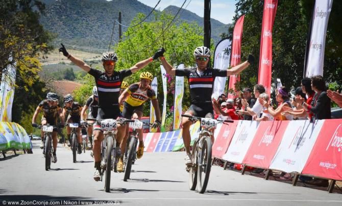 Team Asrin Cycling's Jens Schuermans (left) and James Reid celebrate their victory on stage 3