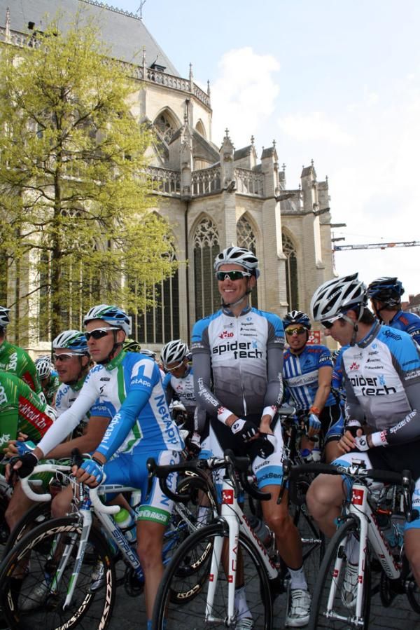 Spidertech riders gather in the shadow of the Leuven cathedral