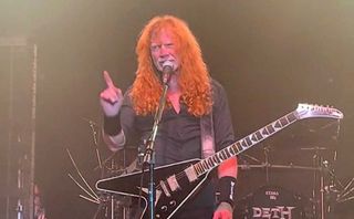 Dave Mustaine admonishing fan onstage