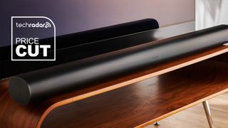 Sonos Arc on entertainment unit with "Price Cut" text and TechRadar logo