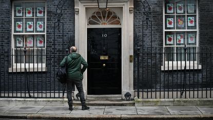 Dominic Cummings stands outside 10 Downing Street.