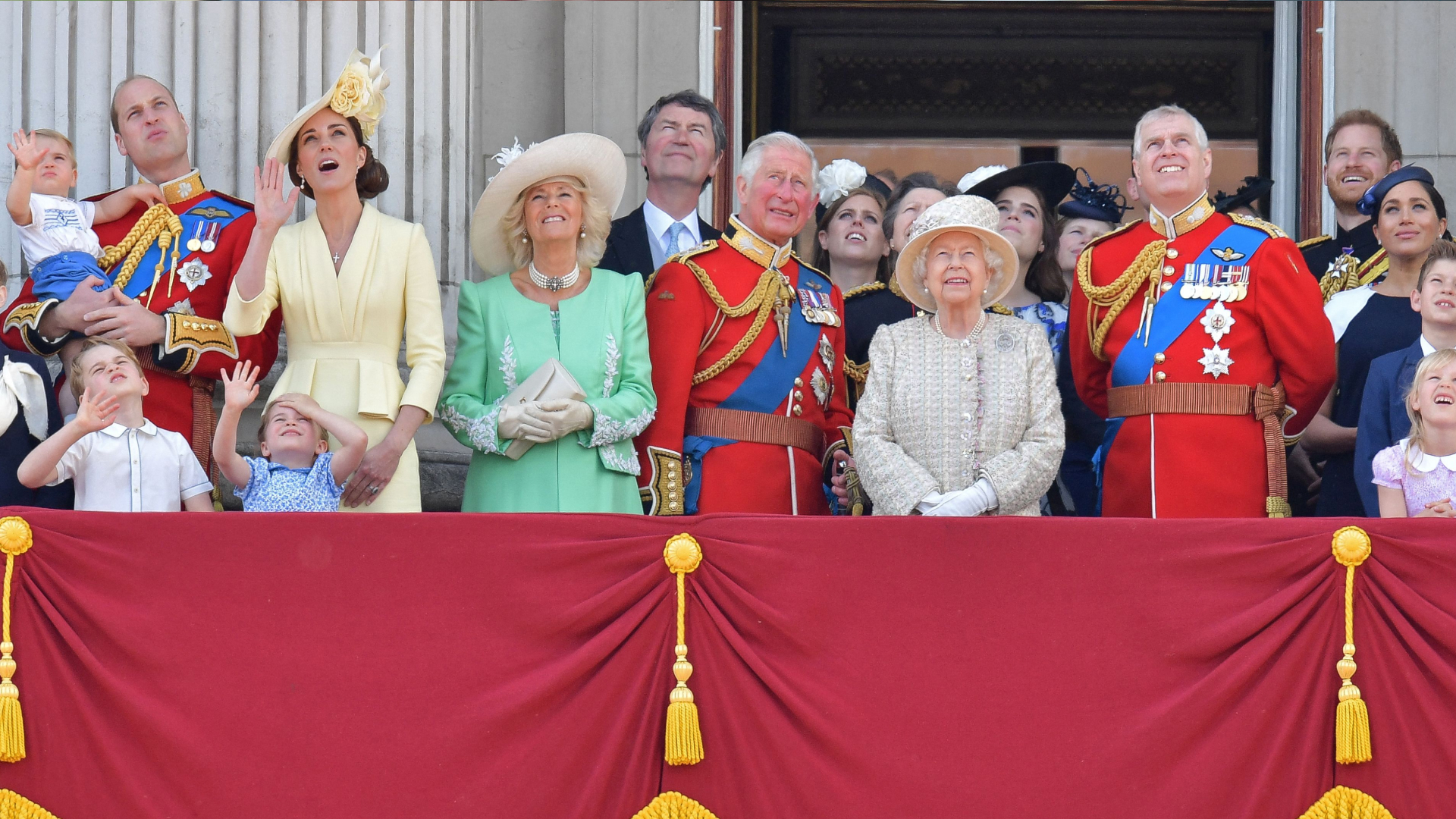 The Royal Family stand on the Buckingham Palace balcony