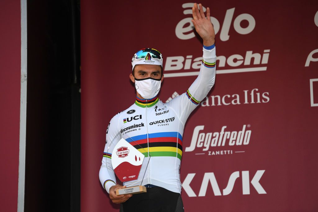 SIENA ITALY MARCH 06 Podium Julian Alaphilippe of France and Team Deceuninck QuickStep Celebration during the Eroica 15th Strade Bianche 2021 Mens Elite a 184km race from Siena to Siena Piazza del Campo Trophy Mask Covid Safety Measures StradeBianche on March 06 2021 in Siena Italy Photo by Tim de WaeleGetty Images