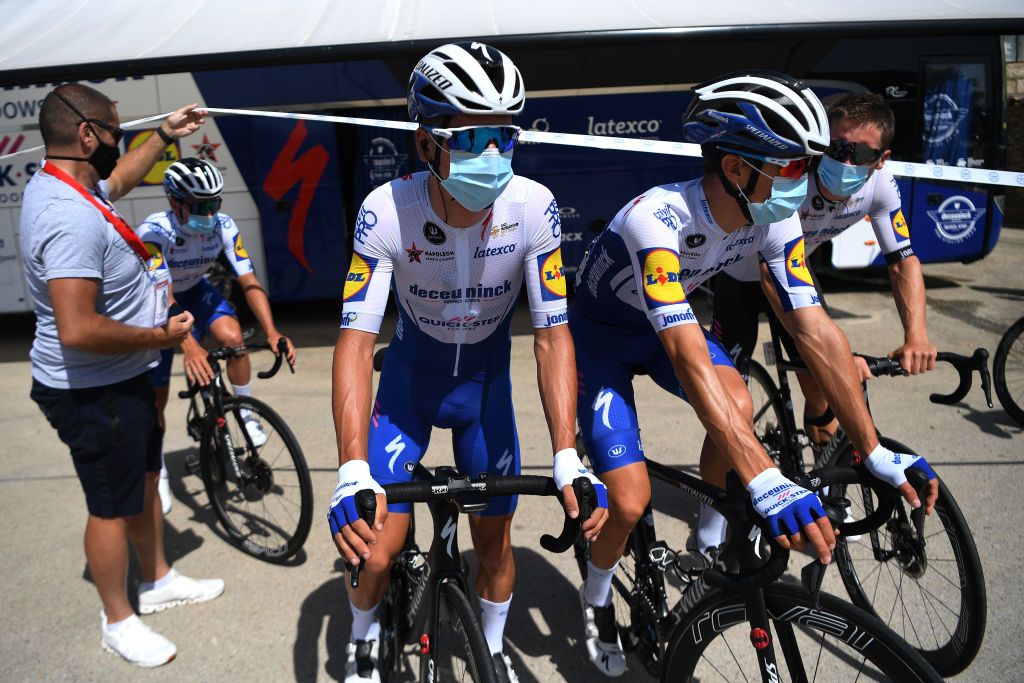 ESPINOSA DE LOS MONTEROS SPAIN JULY 30 Start Andrea Bagioli of Italy and Team Deceuninck QuickStep Joo Almeida of Portugal and Team Deceuninck QuickStep Shane Archbold of New Zealand and Team Deceuninck QuickStep Sargentes de la Lora Village during the 42nd Vuelta a Burgos 2020 Stage 3 a 150km stage from Sargentes de la Lora to Espinosa de los Monteros Picn Blanco 1486m VueltaBurgos on July 30 2020 in Espinosa de Los Monteros Spain Photo by David RamosGetty Images