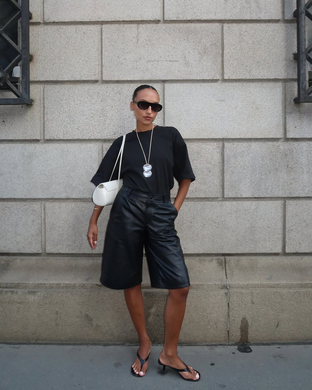 Ingrid in leather shorts and heels