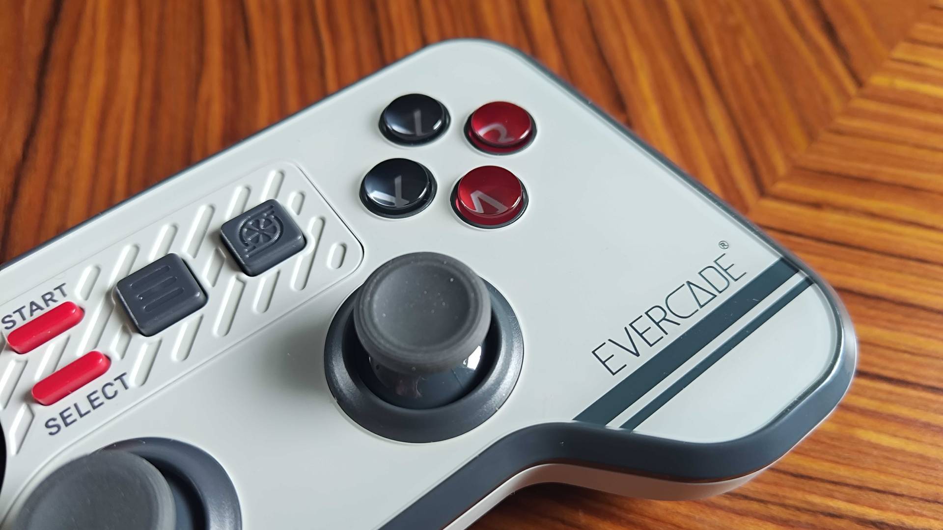 Close up of Evercade Dual Thumbstick Wireless Controller right side with face buttons in view.