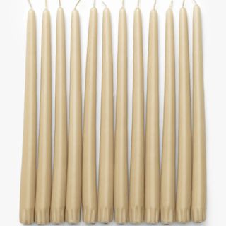 Antique Beige Taper Candles against a white background. 