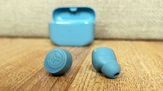the jlab go air pop wireless earbuds with their charging case