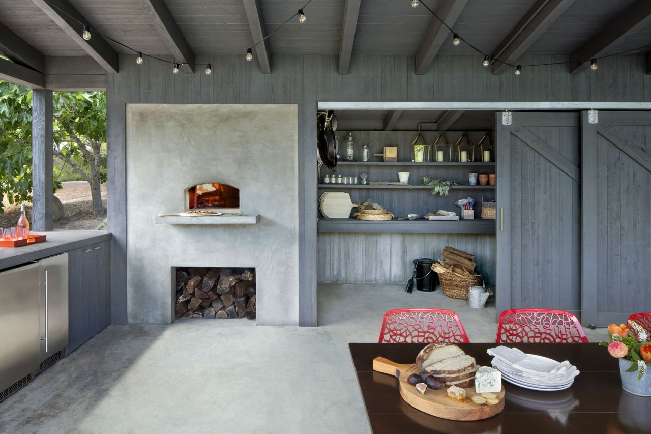 An outdoor spot with a pantry and dining area