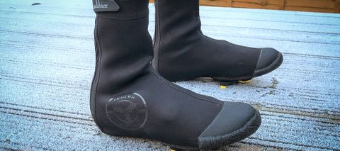Galibier arctic overshoes on frost covered decking 