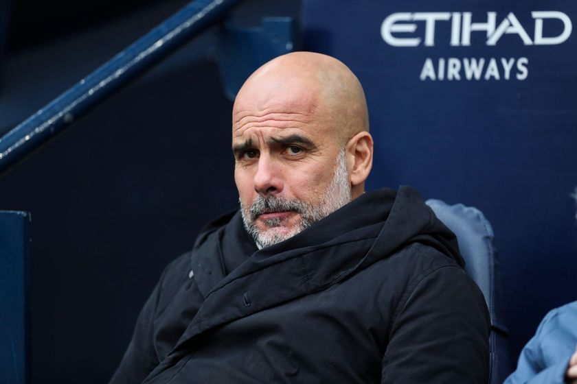 Manchester City manager Pep Guardiola looks on during the Premier League match against Brighton &amp; Hove Albion at the Etihad Stadium in Manchester, UK on 15 March, 2025.